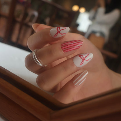 Coquette Bow and Floral Almond Press-On Nails